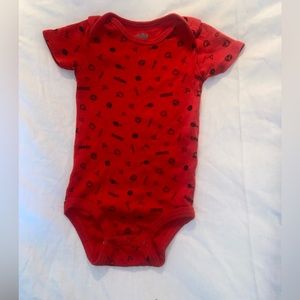 3-12$red rookie onesie 6-9